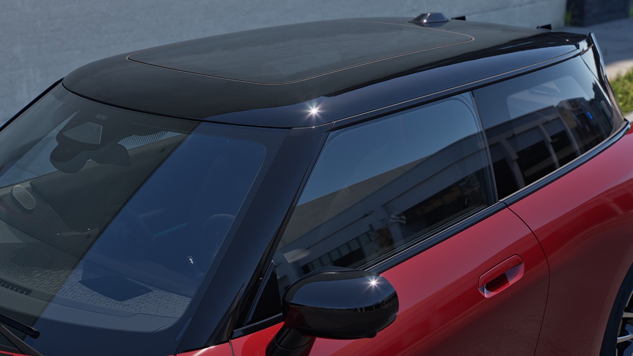 Interior view of all-electric MINI Cooper door with ambiente illumination